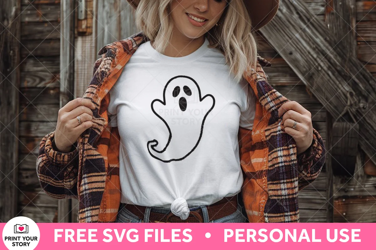 White T-shirt with a simple ghost SVG design and “Free SVG Files • Personal Use” banner