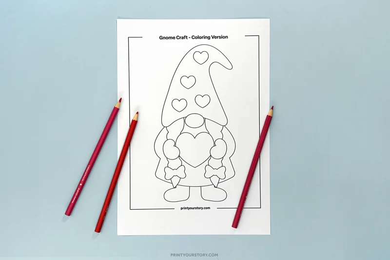 Valentine gnome coloring page printable with heart details and colored pencils