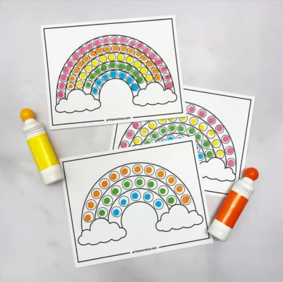 Rainbow dot marker coloring pages with cloud outlines and orange and yellow markers