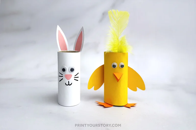 Toilet paper roll bunny and chick crafts with paper ears, wings, feet, googly eyes, and a yellow feather