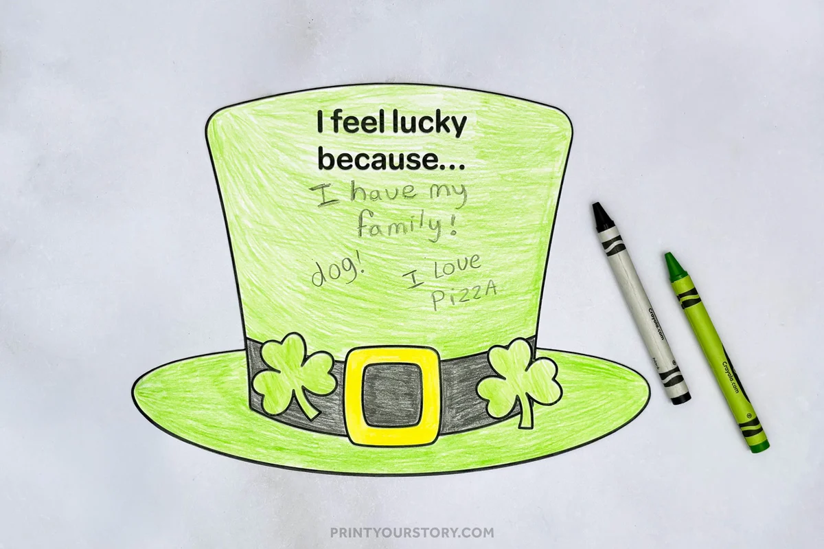 Green St. Patrick’s Day hat craft worksheet reading “I feel lucky because…” with shamrocks and crayons