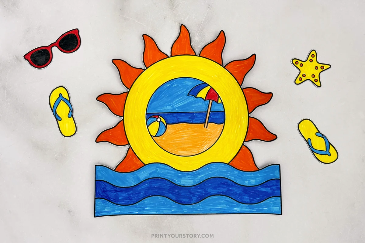 Colored summer photo frame craft with a bright yellow sun, beach scene, blue ocean waves, flip-flops, sunglasses, and starfish, arranged on a gray background before assembly.