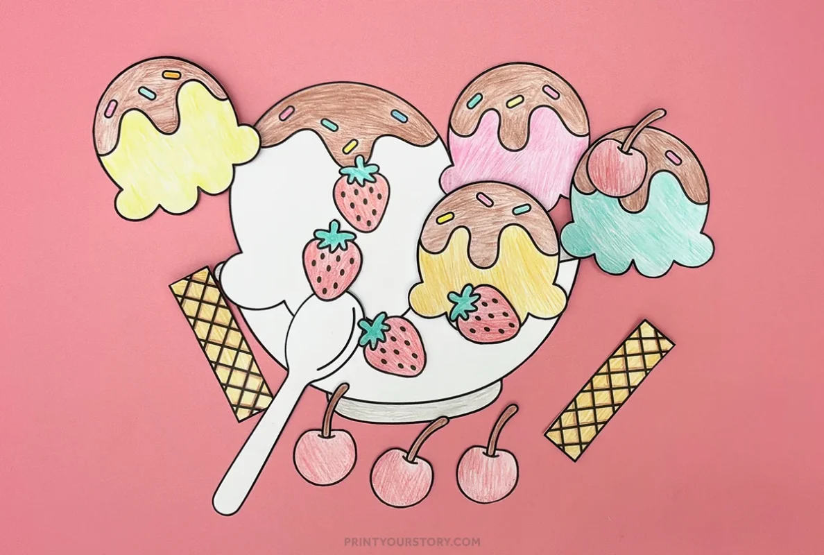 Colored paper ice cream sundae craft with scoops, strawberries, cherries, wafers, and spoon on pink background