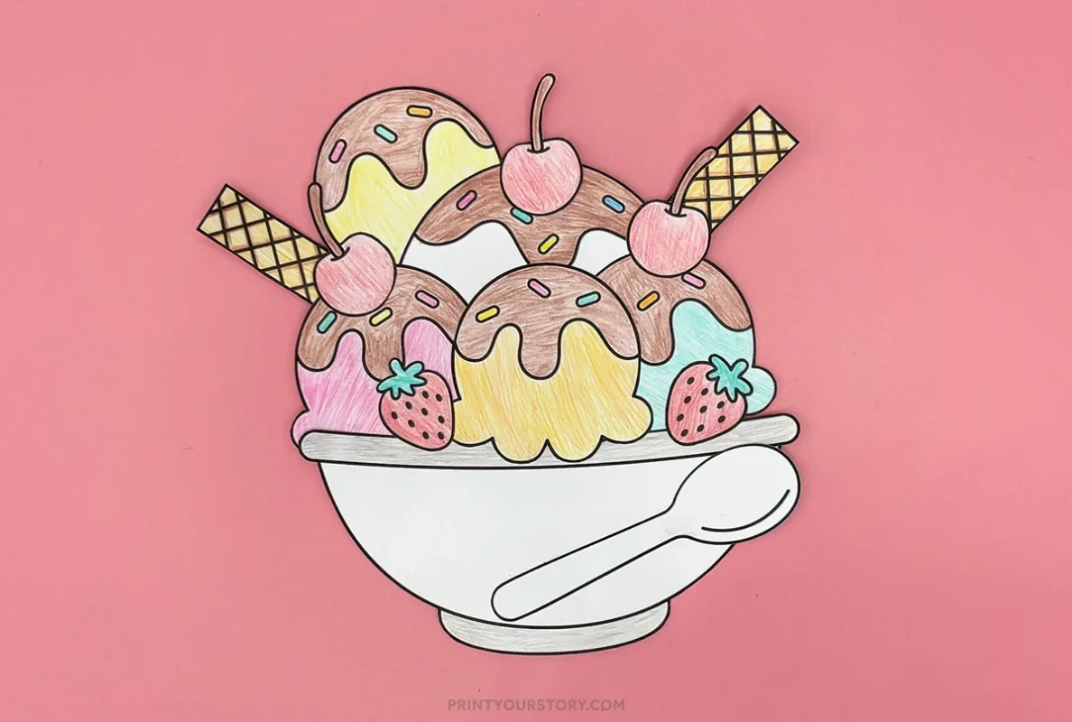 Colored cut-and-paste paper ice cream sundae craft with scoops, cherries, wafers, strawberries, and spoon