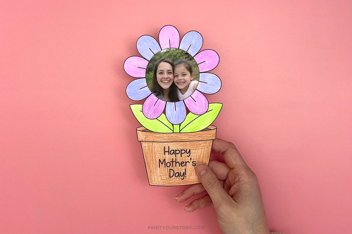Hand holding a paper flower
