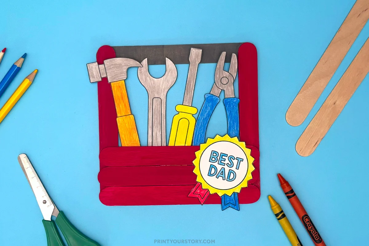Father’s Day popsicle stick toolbox craft with paper tools and a Best Dad badge