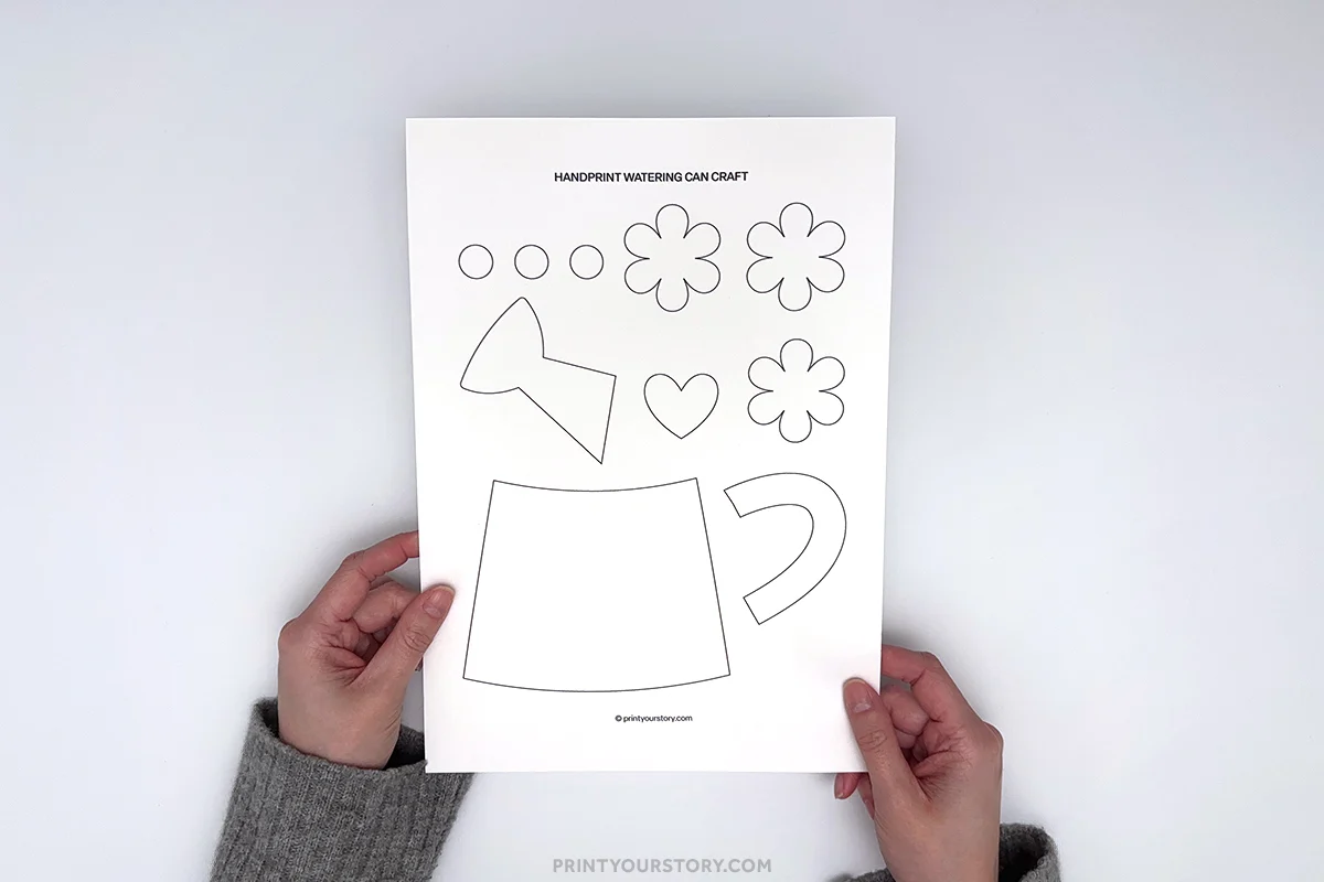 Printable handprint watering can craft template with flower, handle, and water drop cutouts
