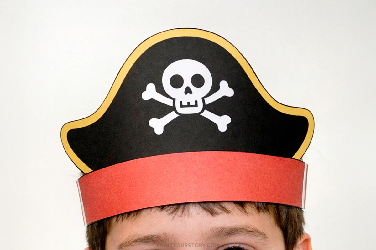 Child wearing a printable paper pirate headband