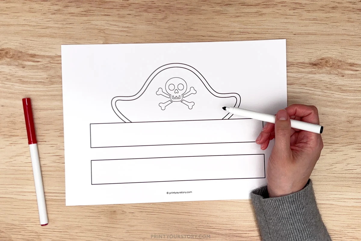 Coloring a printable pirate hat template with skull and crossbones