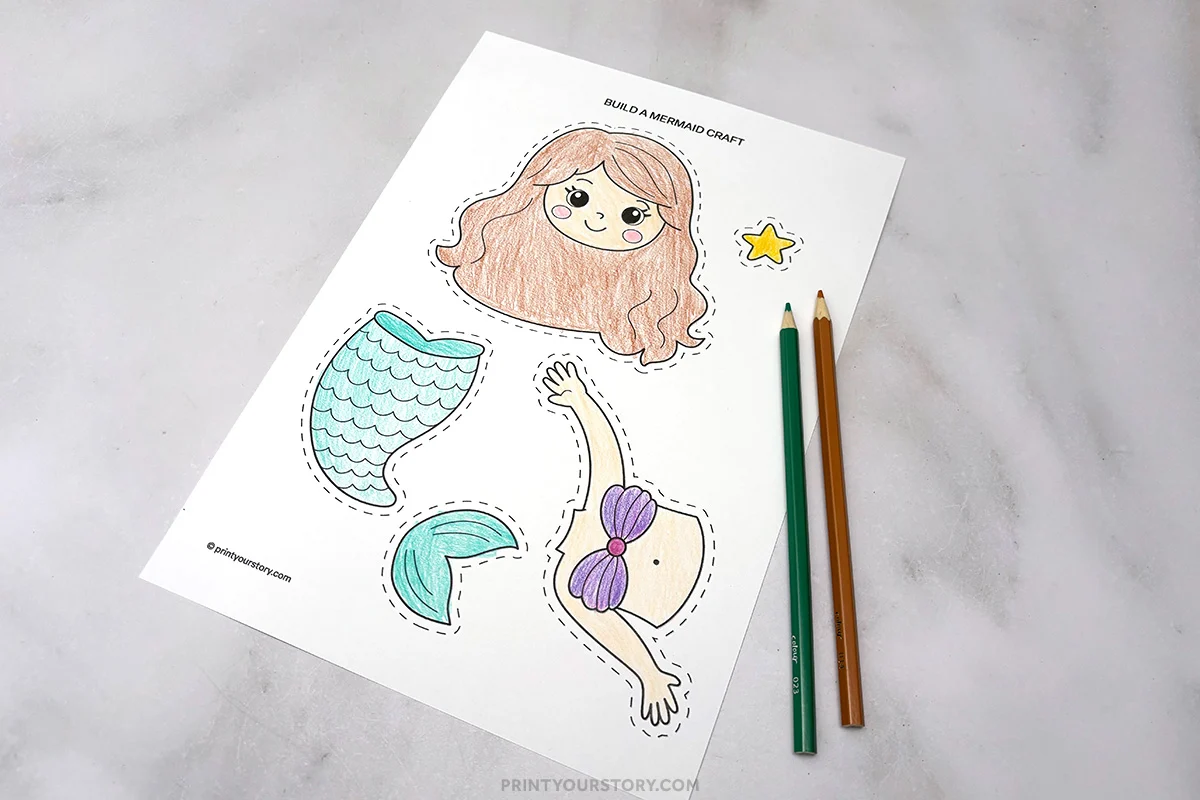Colored mermaid printable craft template with cutout pieces and two colored pencils
