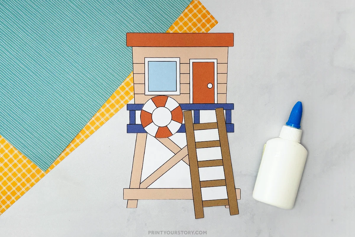 Paper lifeguard tower cut and paste craft with glue and patterned paper