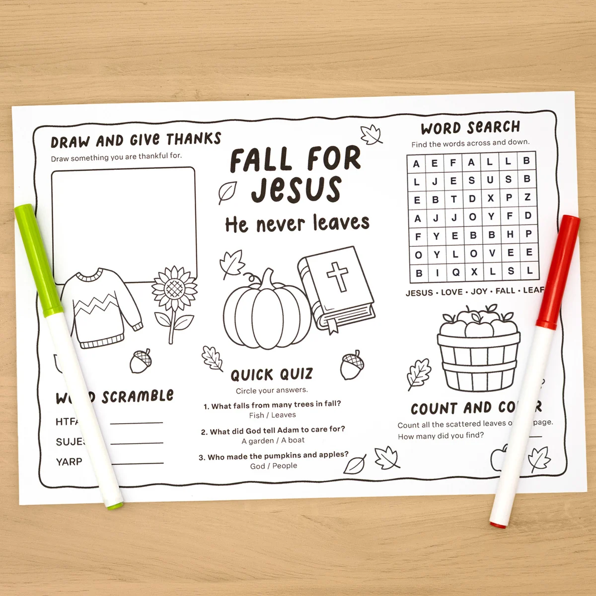 Fall for Jesus printable kids activity placemat with word search, word scramble, quiz, and coloring sections