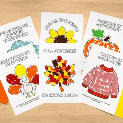 Five Christian fall torn paper craft printables with a turkey, sunflower, pumpkin, leaf, sweater, and cloud on a table
